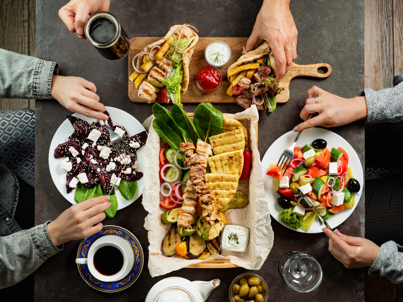 People Eating Greek Food. Greek Cuisine